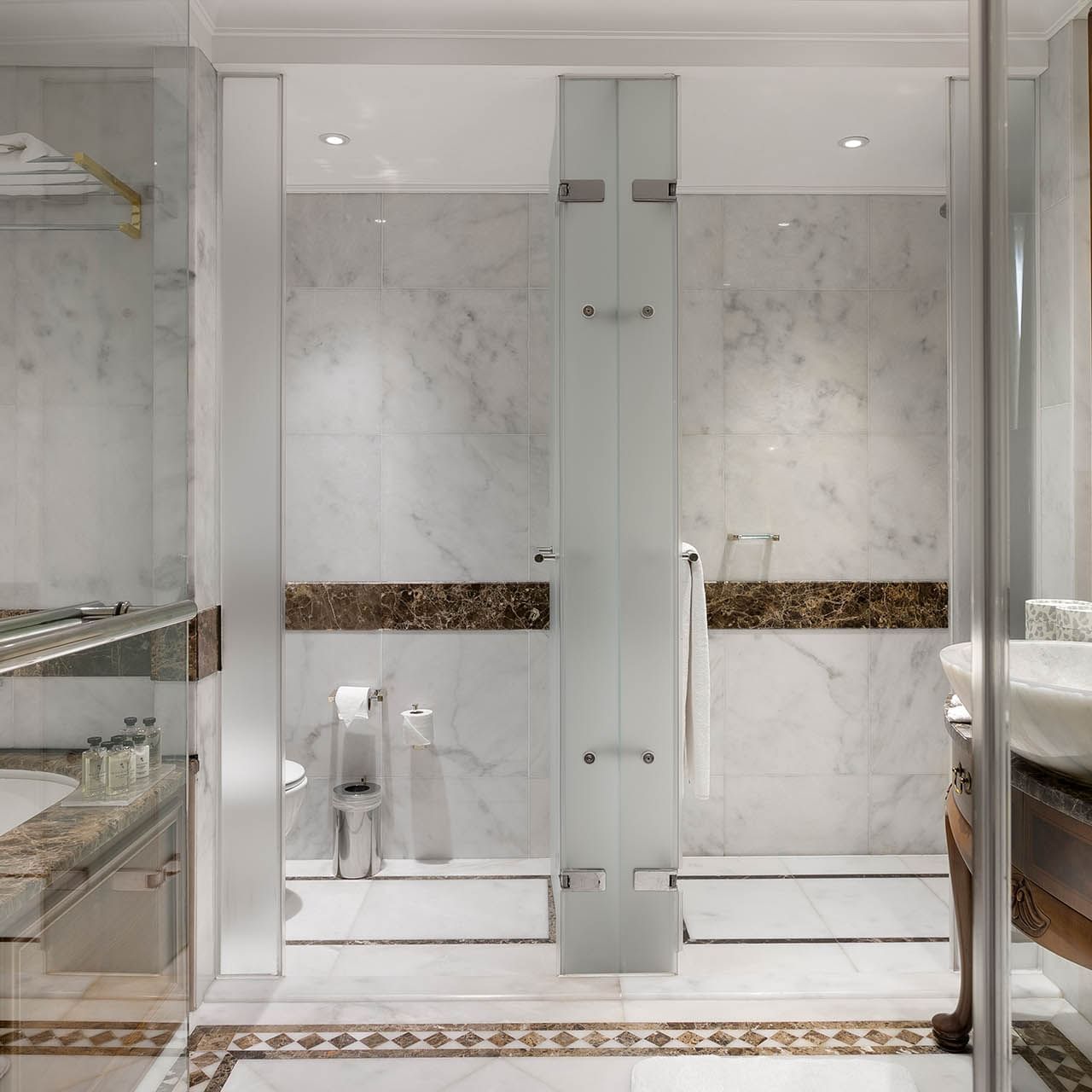 Bathtub and shower area in Premium Sea/Pool View Room at Titanic Mardan Palace