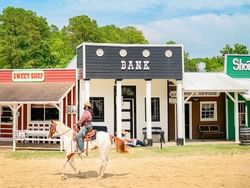 Man riding horses in the town near Holiday Inn Hotel & Suites