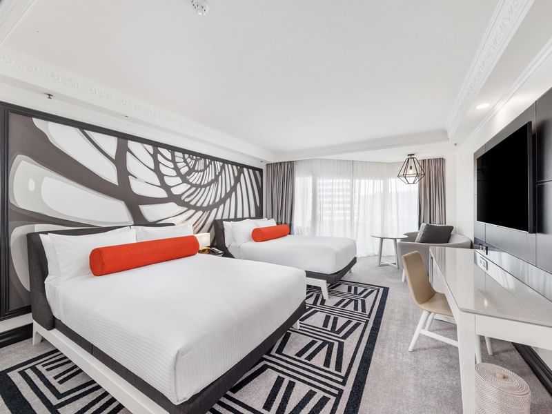 Large double beds & decor in Grand Superior City Mountain View Room of Pullman