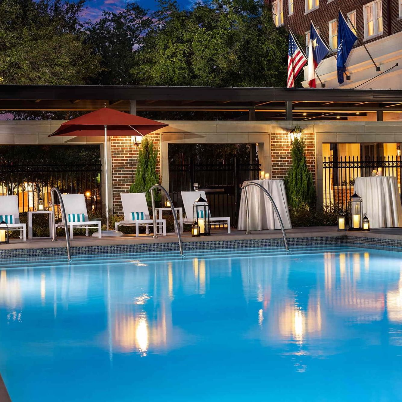 Warwick Melrose Dallas swimming pool evening cocktail