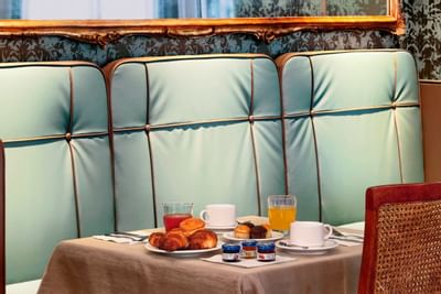 Breakfast nook arranged in a restaurant at Hotel Bisanzio