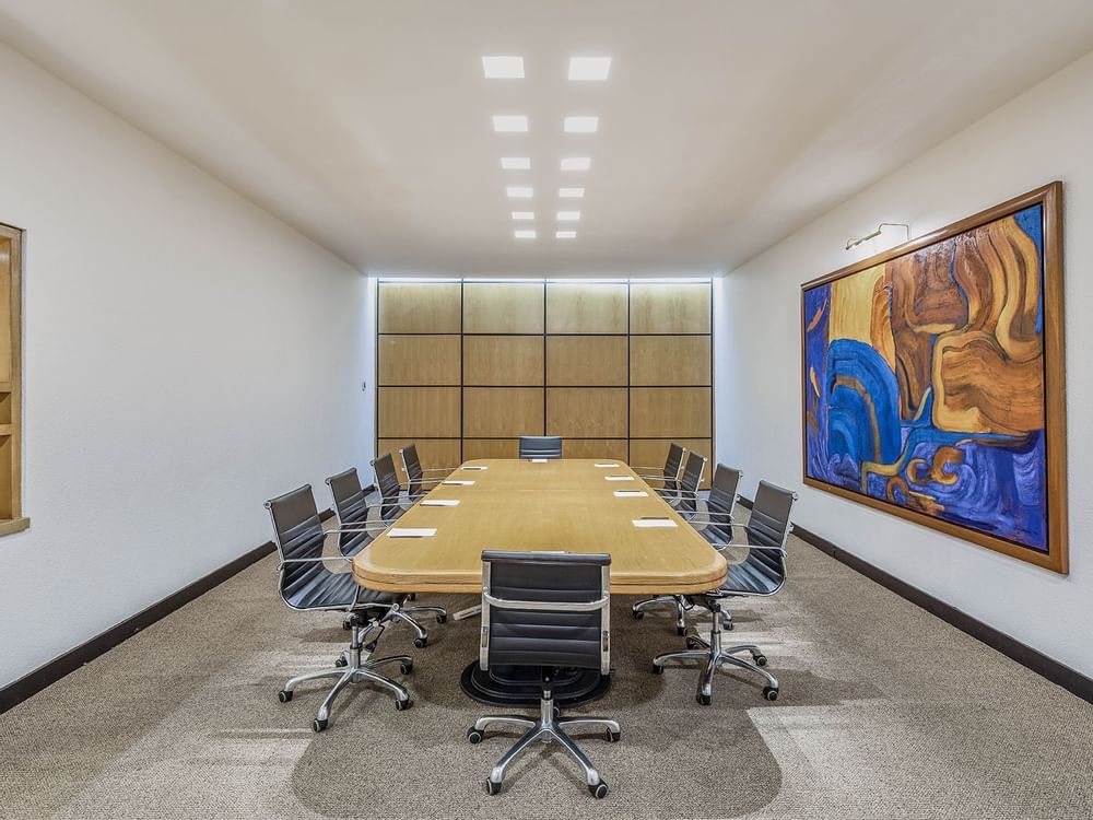 Meeting table setup in a business center at FA Hotels & Resorts