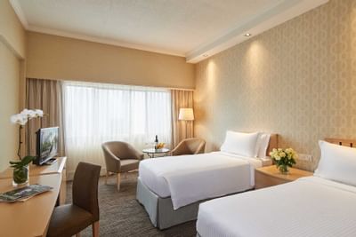 Work desk & seating area by the beds in Superior Room at York Hotel Singapore