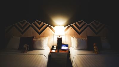 Twin beds in Queen Queen Studio Deluxe at Summit Lodge