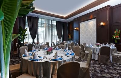 Promotional poster for the celebration of independence with a prawn dish in the background at VE Hotel & Residence