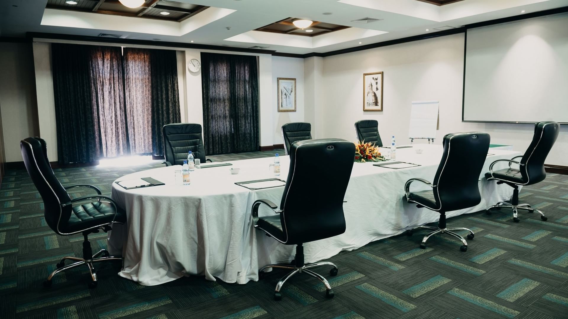 Elegant Bugala Hall setup for meetings at Lake Victoria Serena Golf Resort & Spa in Kampala.