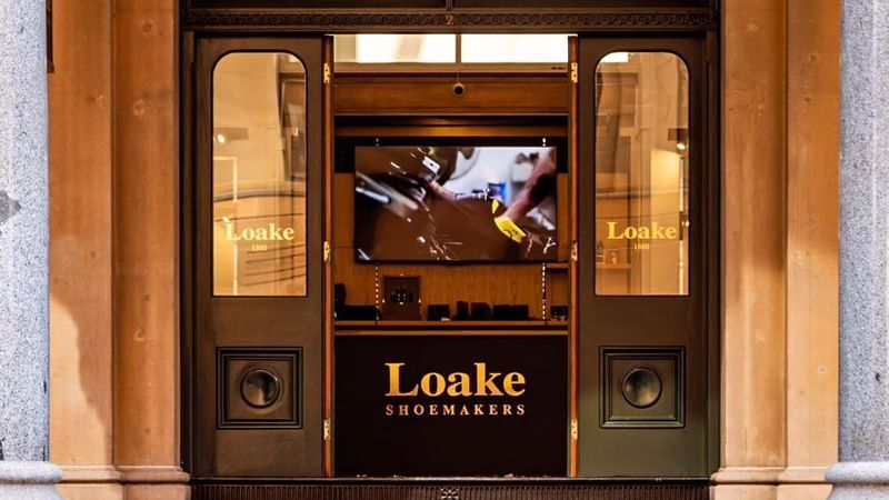 Entrance view of Loake Shoemakers near Fullerton Hotel Sydney