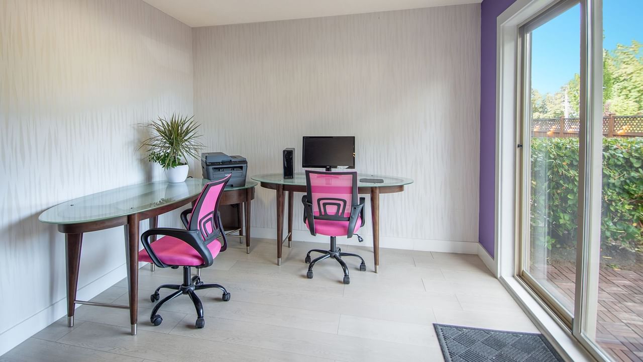 Business centre Coast Parksville Hotel with chairs, computer, printer and tables