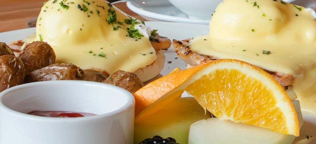 A close-up of eggs Benedict at a Canmore brunch restaurant.