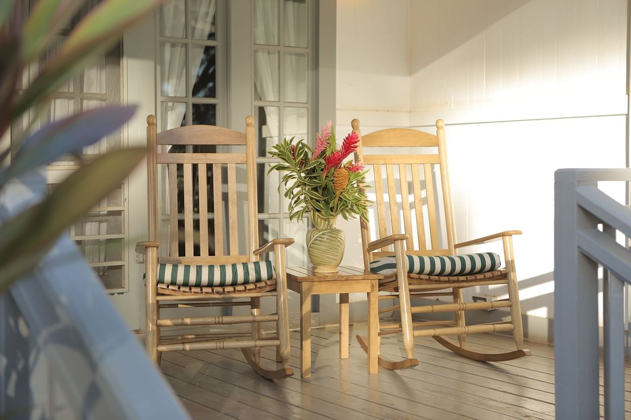 Rocking Chairs on a patio at Waimea Plantation Cottages
