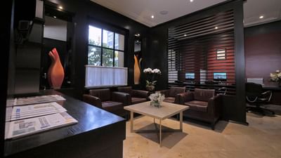 Lounge area with plush seating by the Business Center at The St. Regis Hotel Vancouver