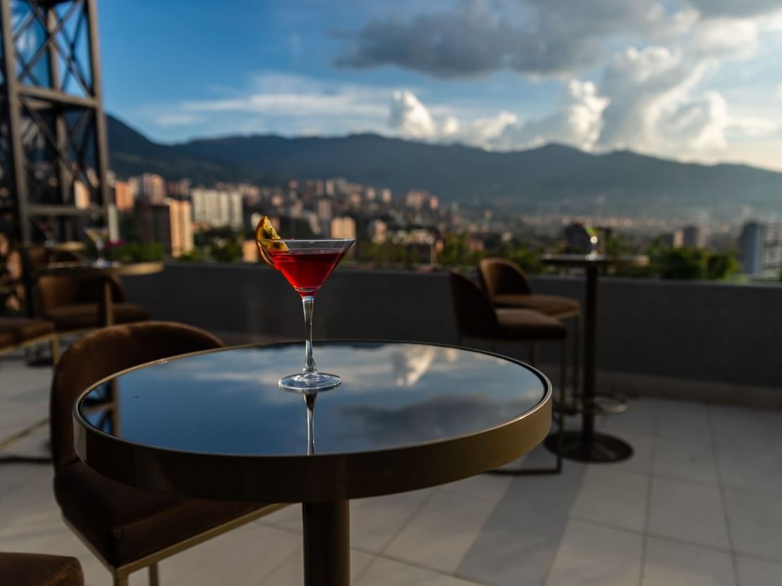 A cocktail served with a nice view at Blue Doors Hotels
