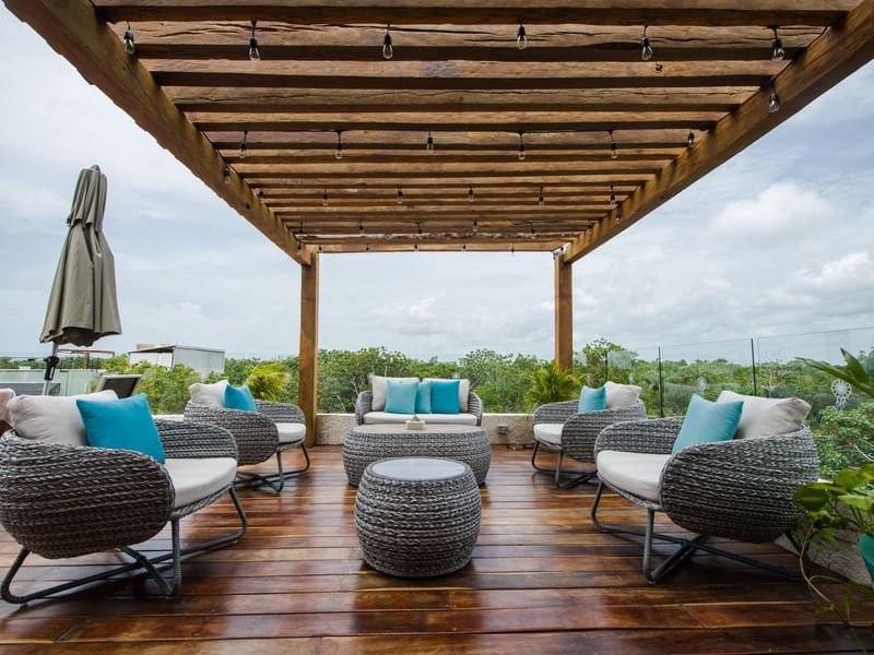 Outdoor lounge chairs at Naay Tulum Curamoria Collection
