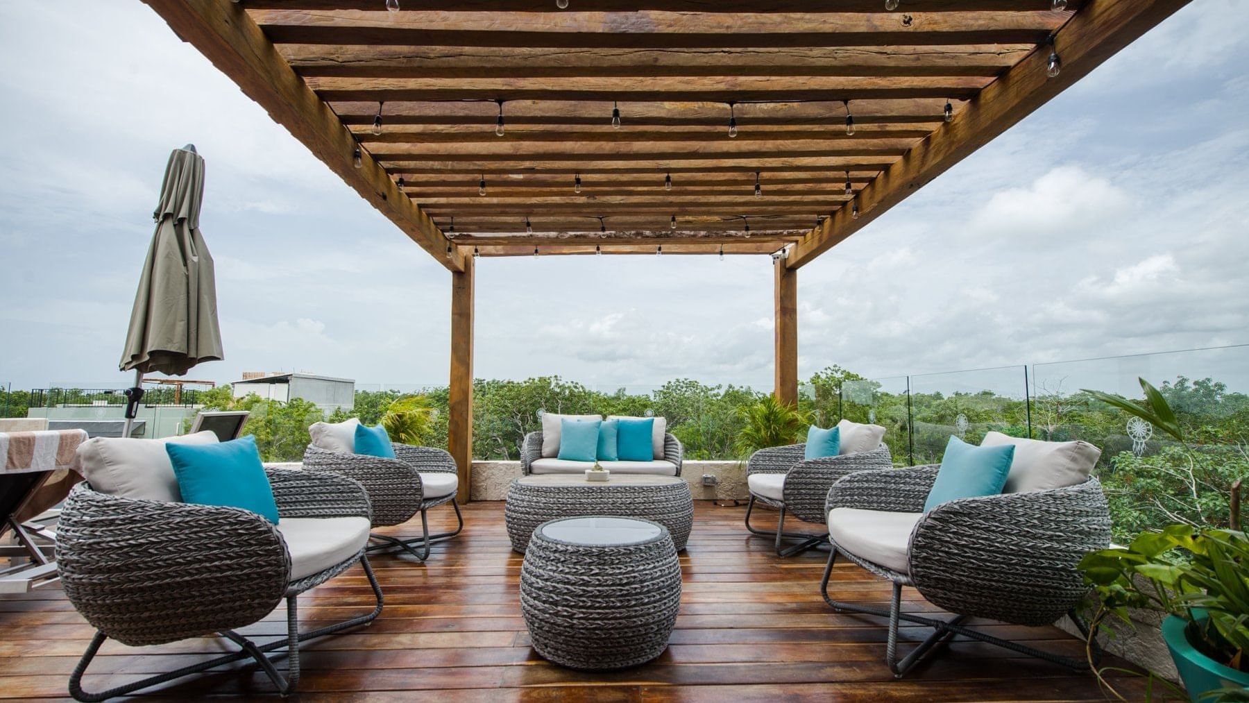Outdoor lounge chairs at Naay Tulum Curamoria Collection