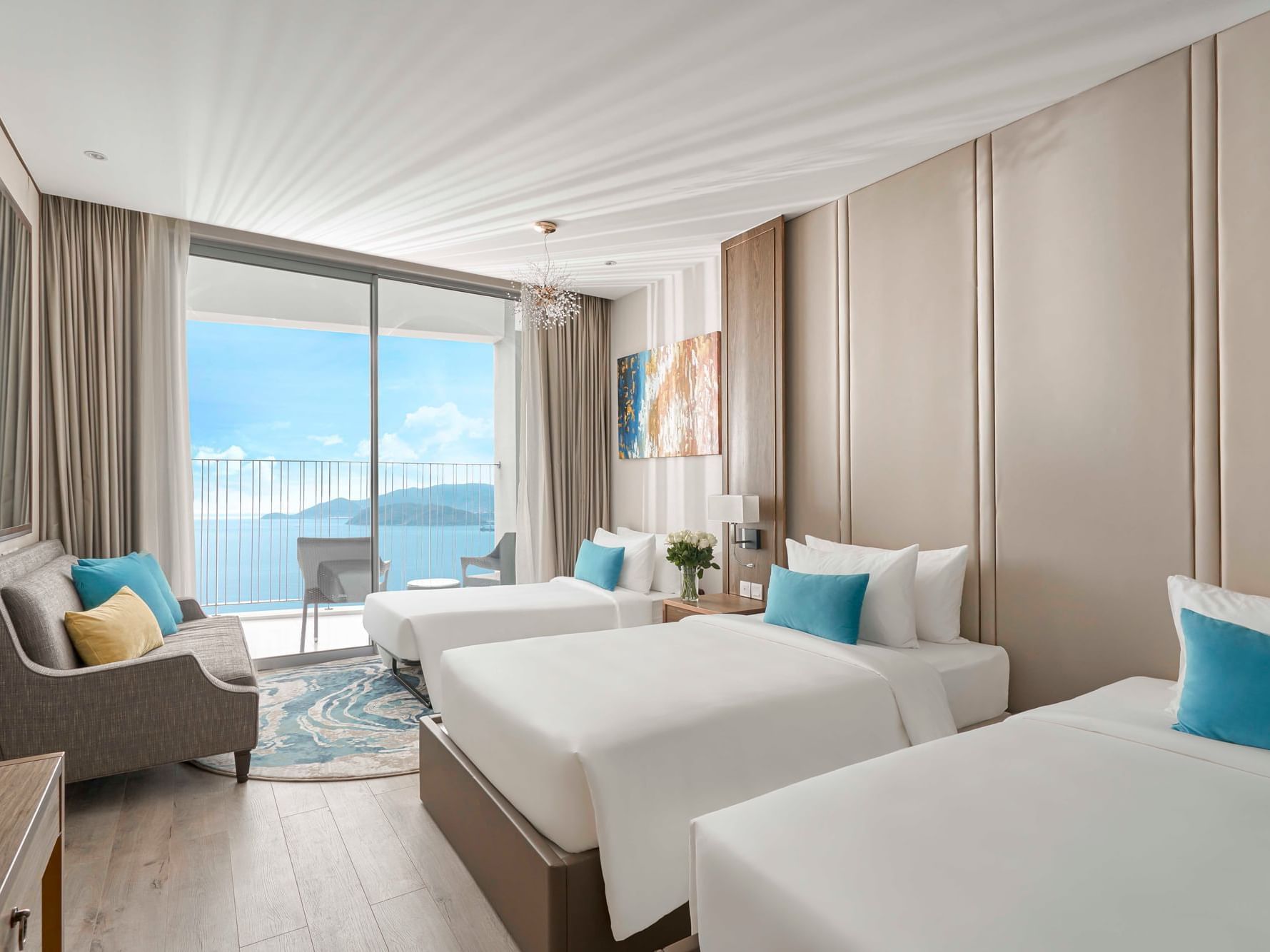 Three Beds in Deluxe Sky Ocean View Room at Eastin Hotel
