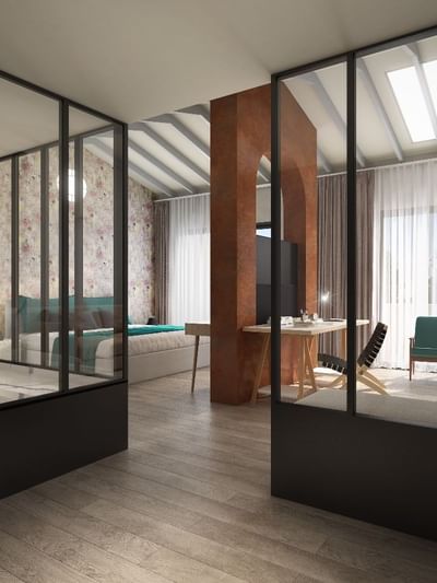 Vue 3D d'une chambre avec lit, table, chaises, et séparation en verre.