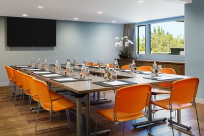 U shape set-up in Malibu Room which is a hotel meeting room in Los Angeles at Luxe Sunset Boulevard Hotel