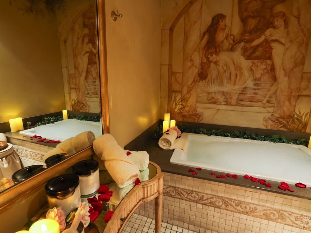 roman bath set with candle and rose petals