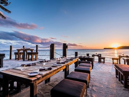 Dining tables in Wicked Walu Sunset Terrace at Warwick Fiji