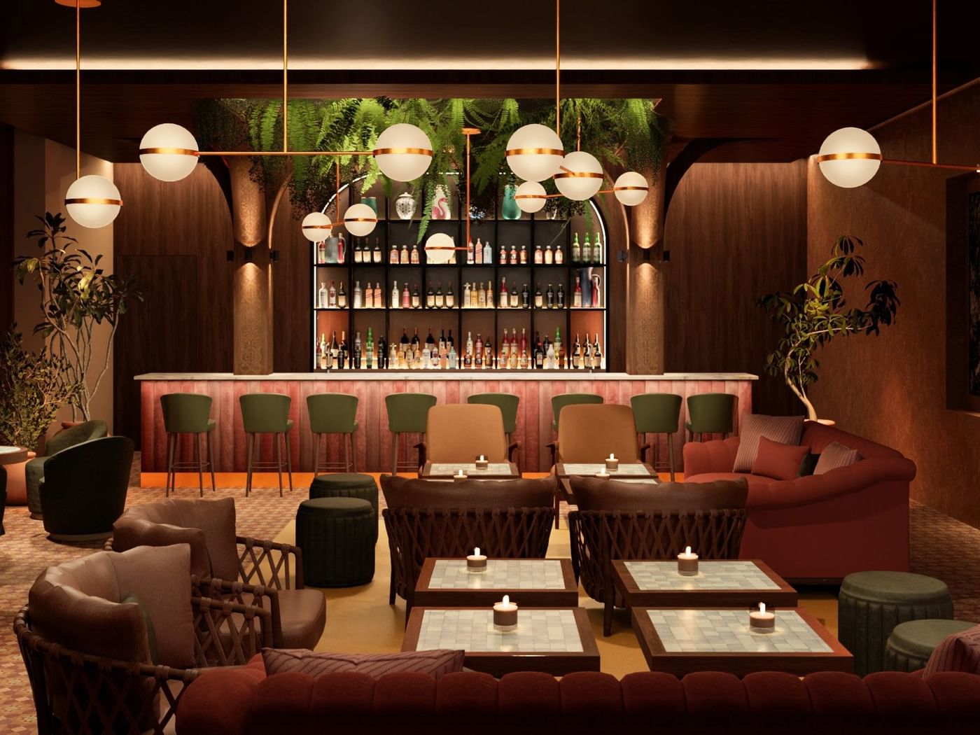 The Reserve Bar at Fiesta Americana Funeeq Punta Cana Hotel with gold lights & plush red velvet seating