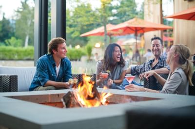 Four people in the outdoor area at Topnotch Stowe Resort