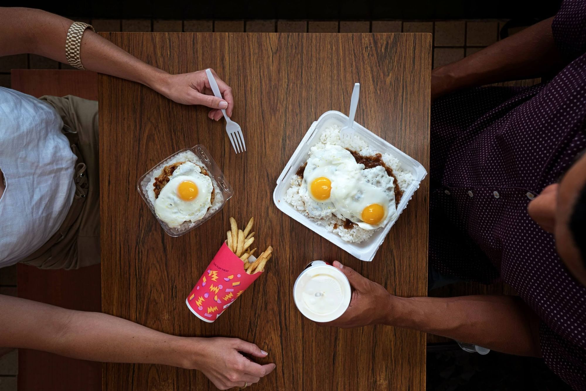 Egg & French Fries served on a table at Waikiki Resort Hotel