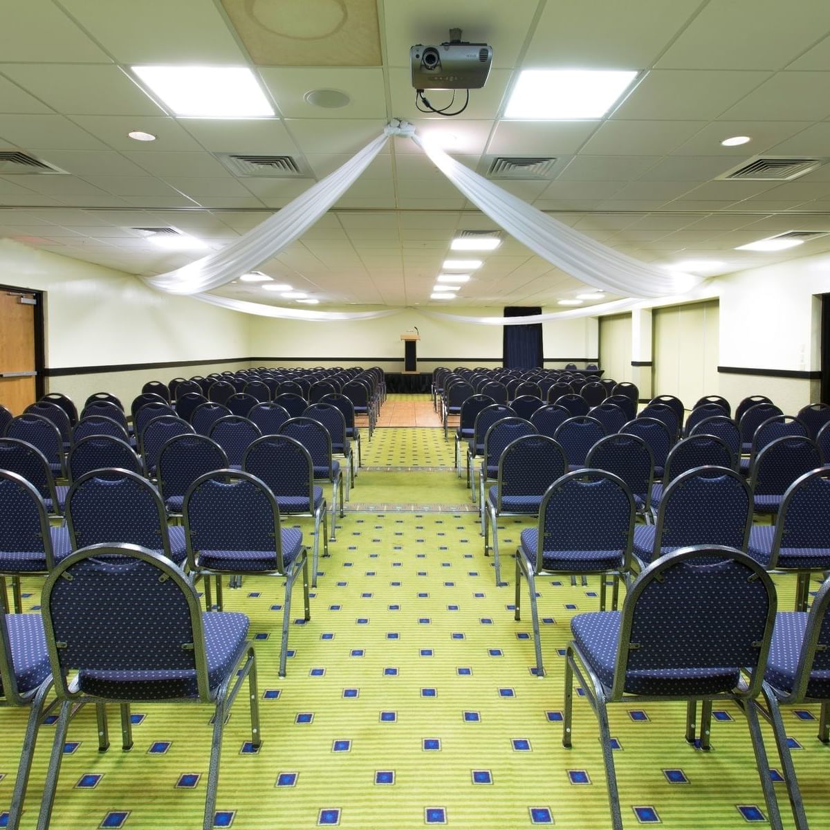 Chairs arranged for a seminar at Flamingo Express Hotel