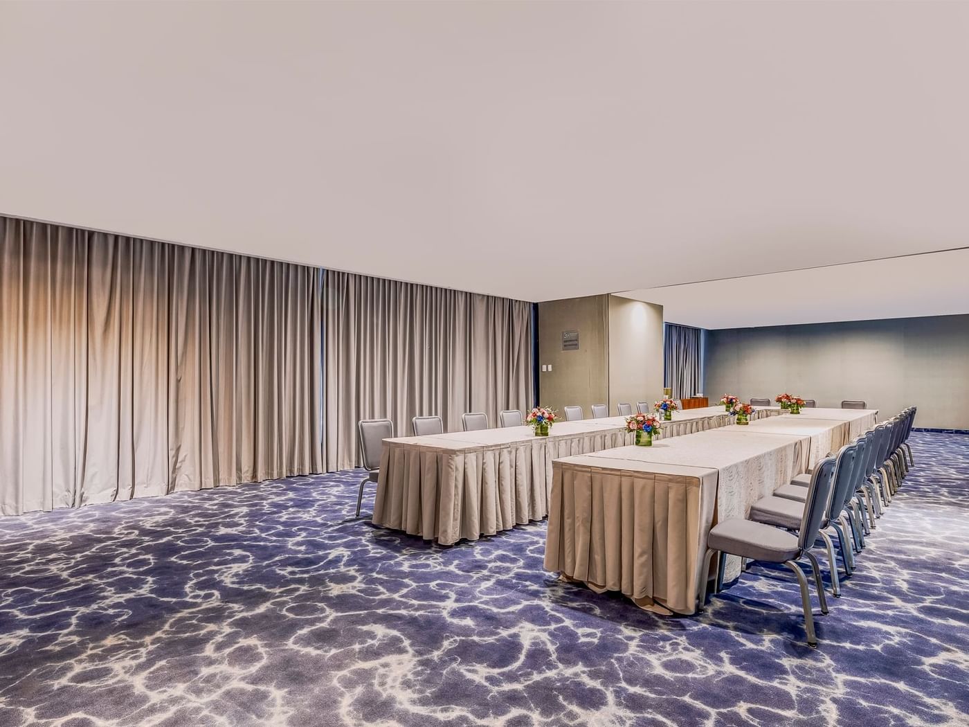 U-shaped meeting room set up in Valle II Room at Live Aqua Resorts and Residence Club