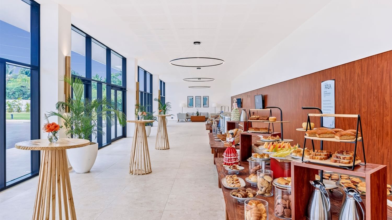 Long hallway with a buffet table arranged at Live Aqua Punta Cana