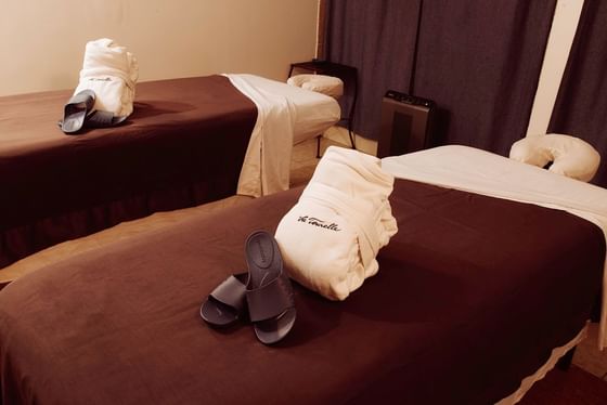Spa beds with amenities in Moon Spa at La Tourelle Hotel and Spa