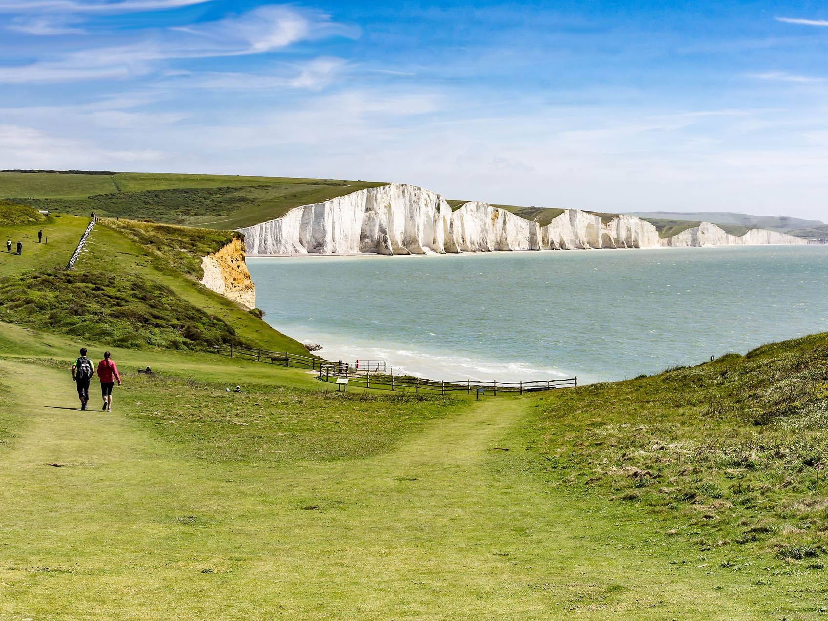 People climbing in the Seven Sisters near The View Eastbourne