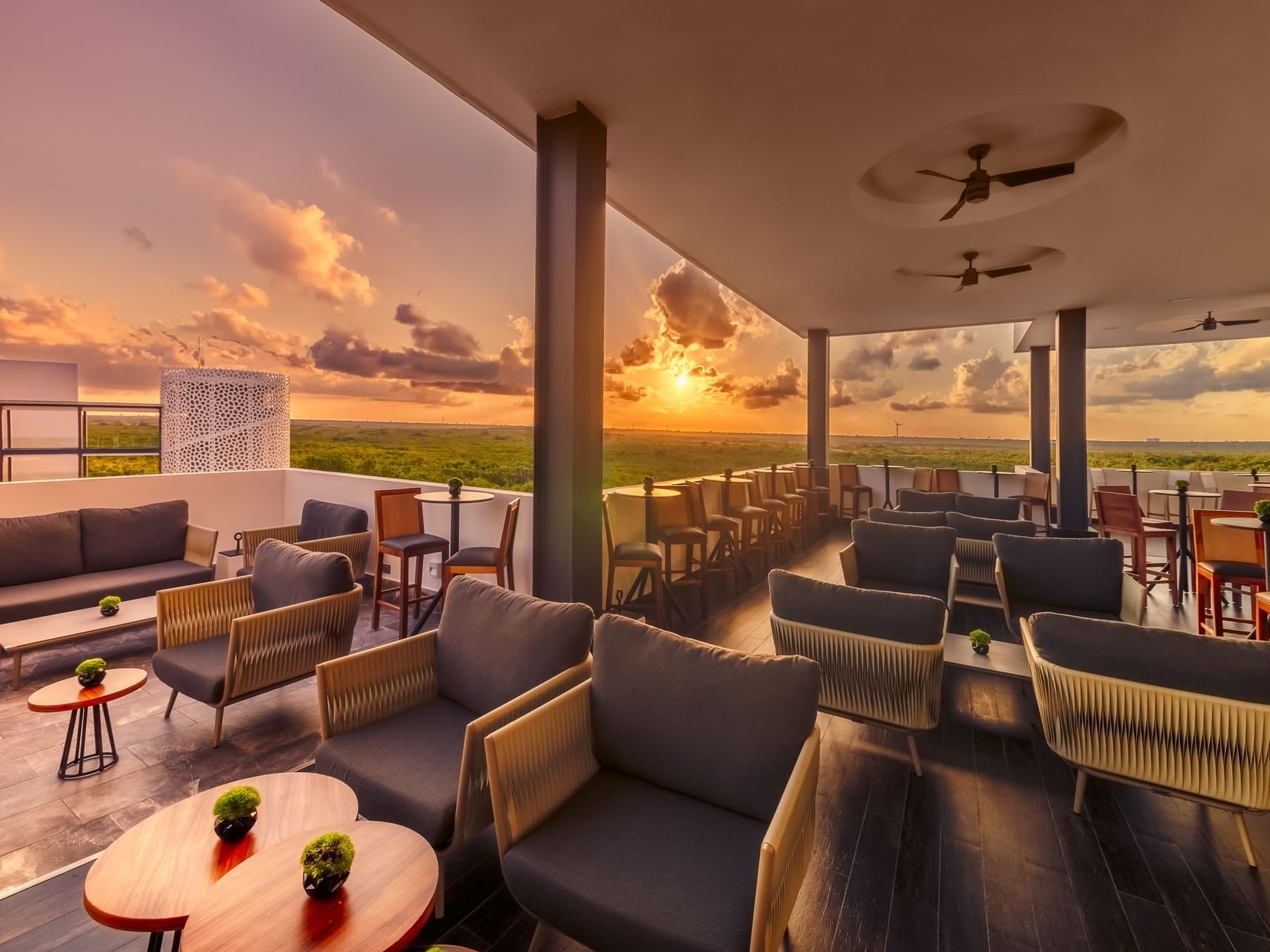 Interior of Limes American Style bar during Sunset at Haven Riviera Cancun