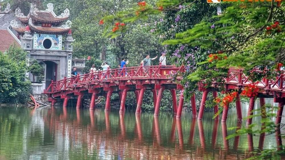 Wooden bridge with a red in railing Ngoc Son Temple near Sunway Hotel Hanoi