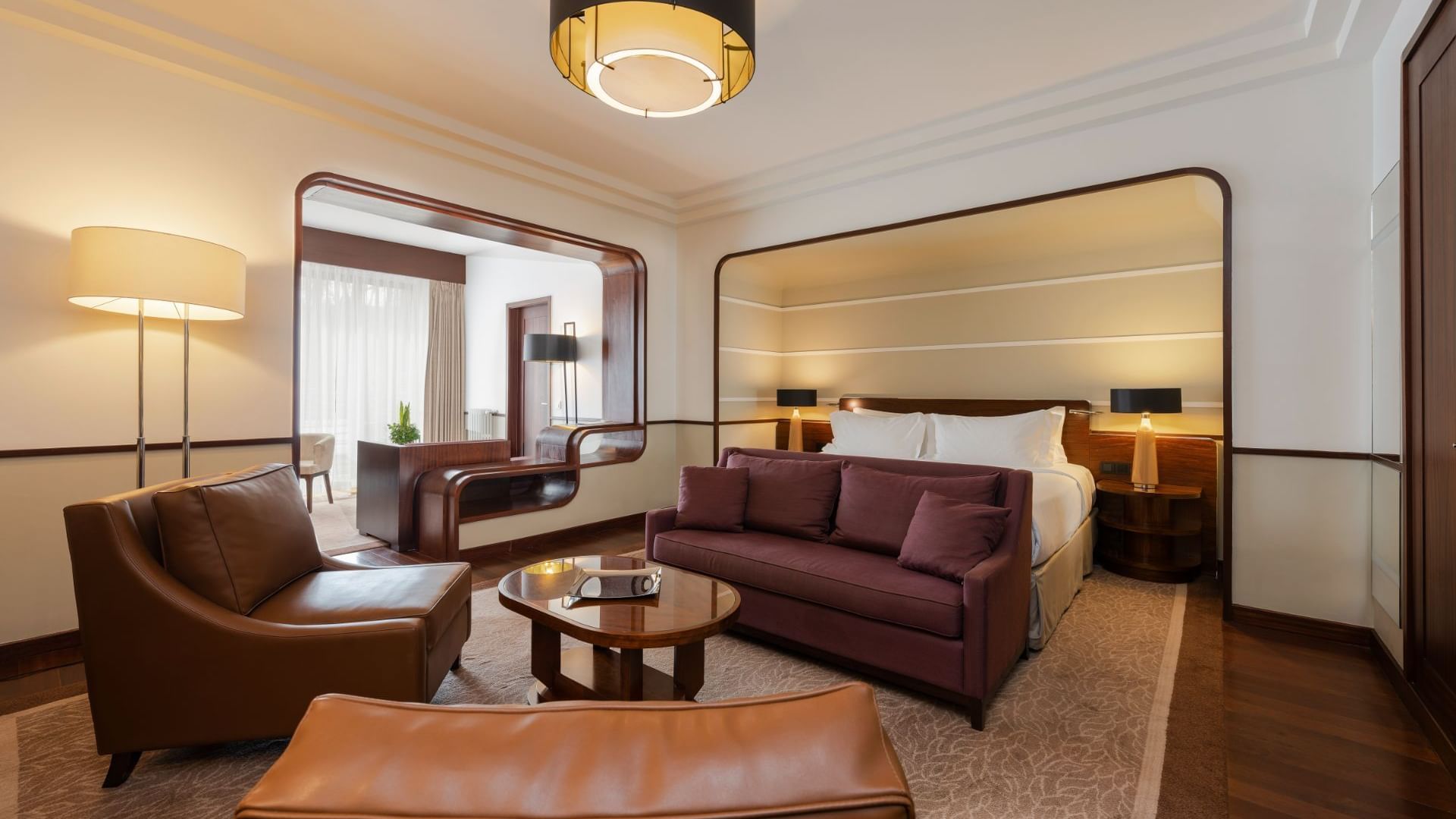 Comfy sofas, coffee table & lamps in living area of a Suite at Terra Nostra Garden Hotel