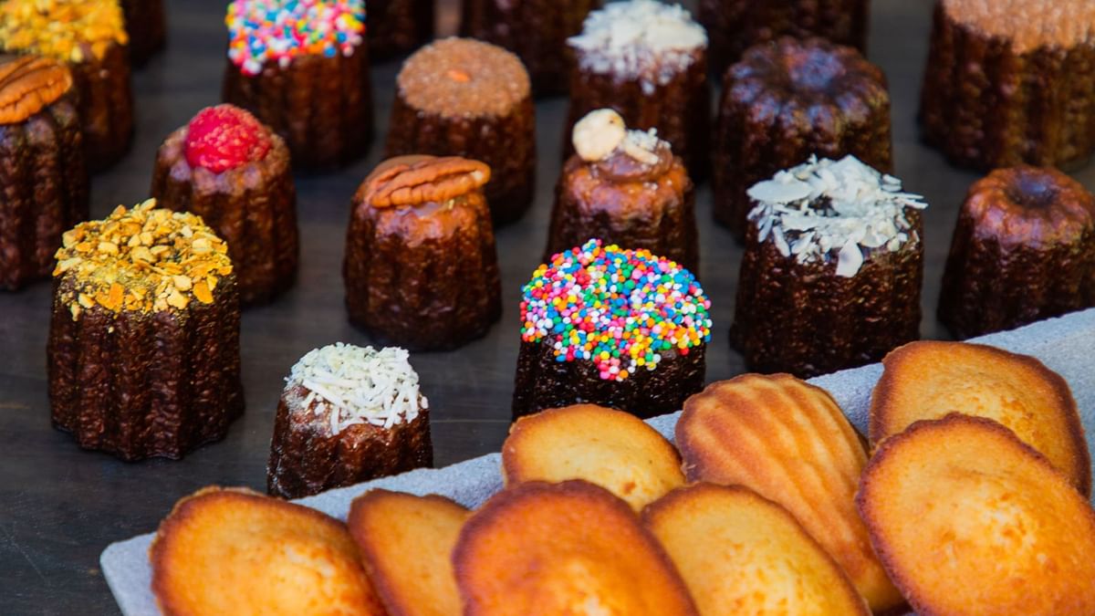 French pastries, canelés, and madeleines, adorned with sprinkles in Sacrebleu at Crown Hotels