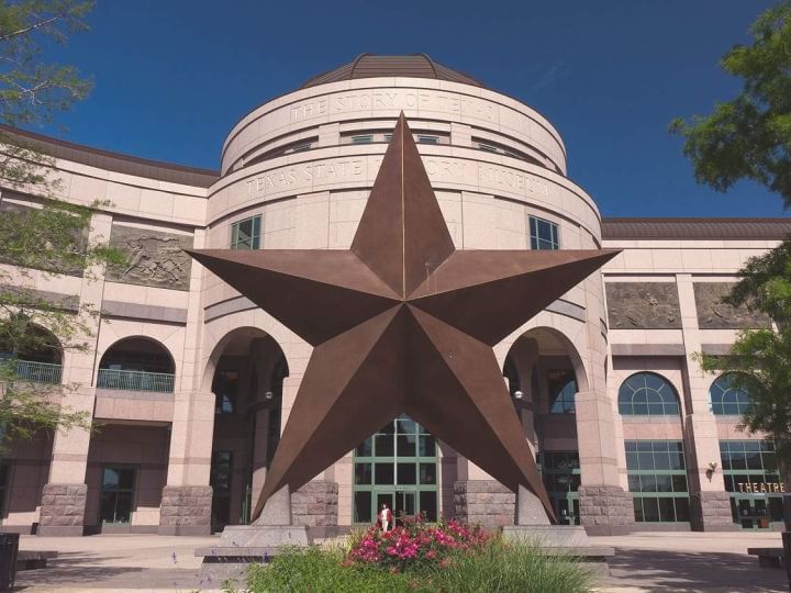 Star statue outside of Bullock Museum near Austin Condo Hotel