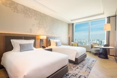 Two beds, work desk & lamps in Superior Panorama room at Eastin Grand Hotel Phayathai