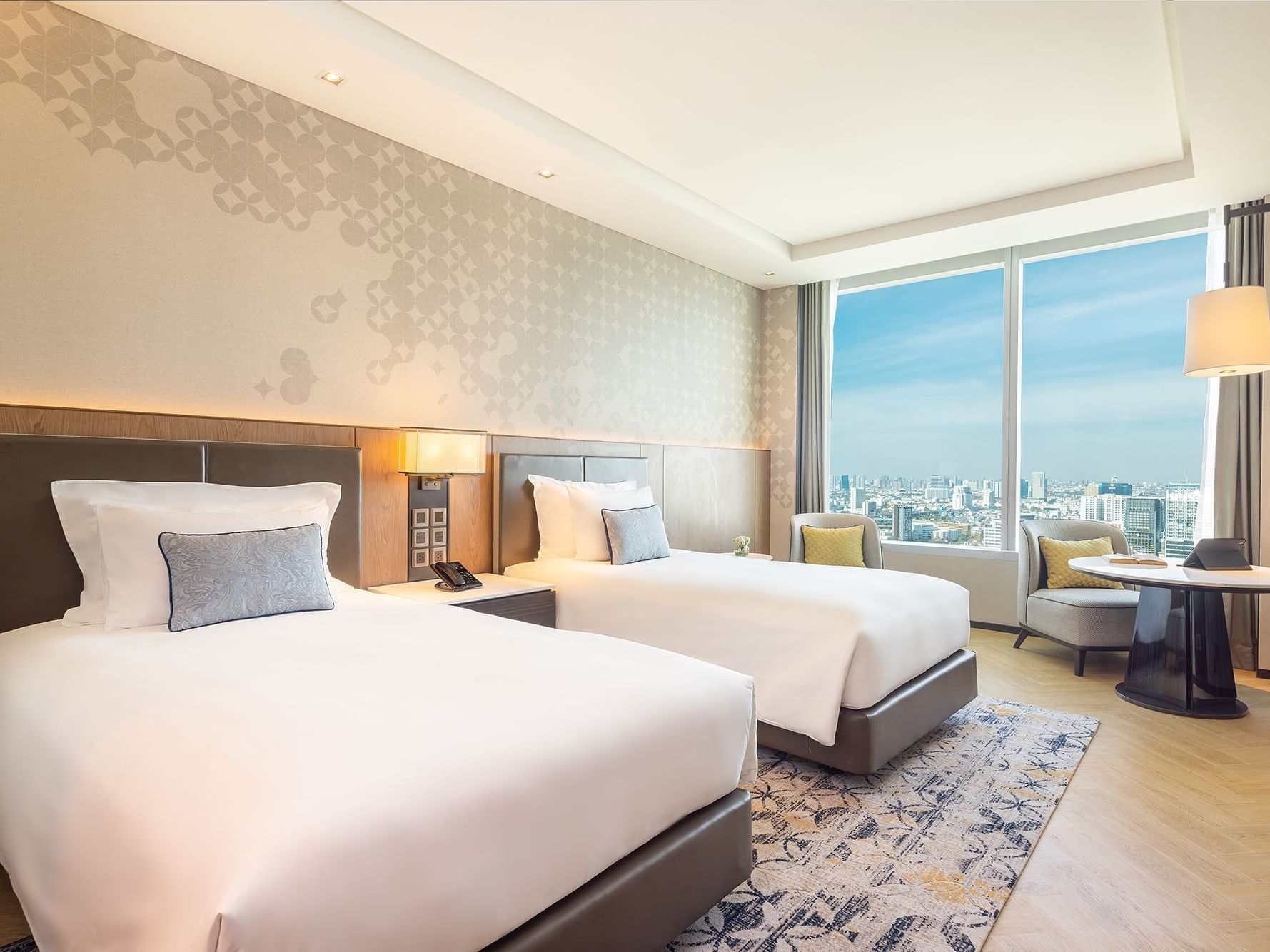 Two beds with comfy pillows & lamps in Superior Panorama at Eastin Grand Hotel Phayathai