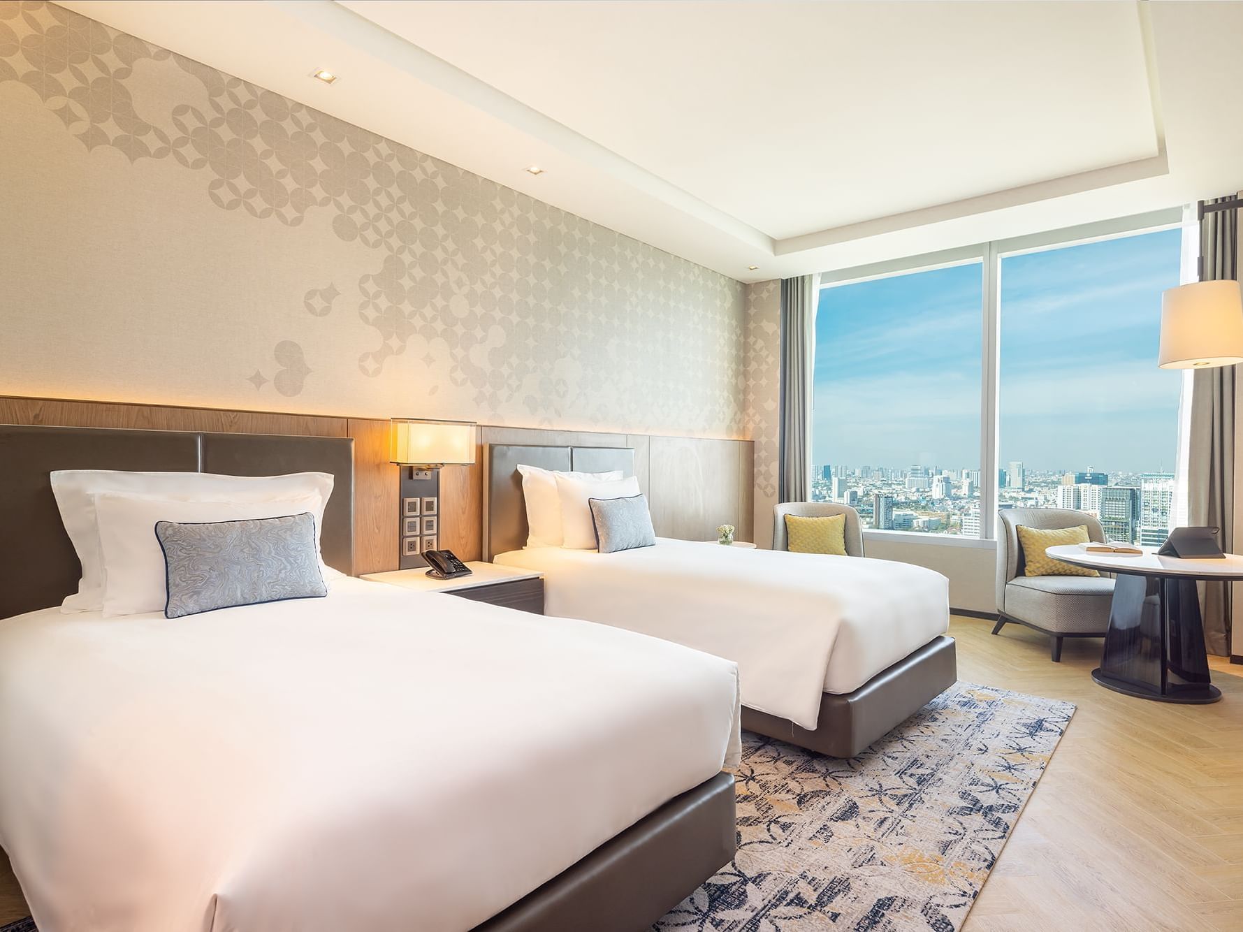 3 Double beds with city view in Superior Panorama suite at Eastin Grand Hotel Phayathai