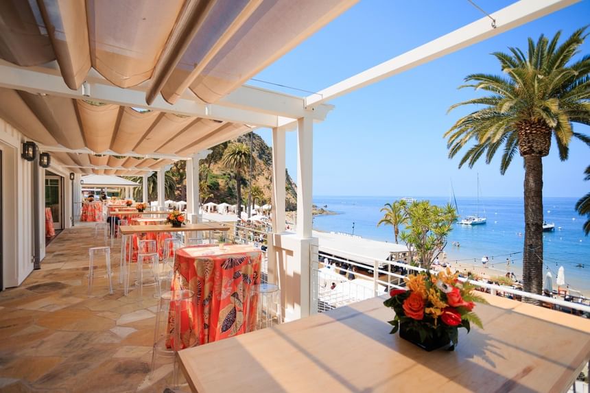 Open-air dining area arranged for the Catalina Wine Mixer at Catalina Island luxury hotels