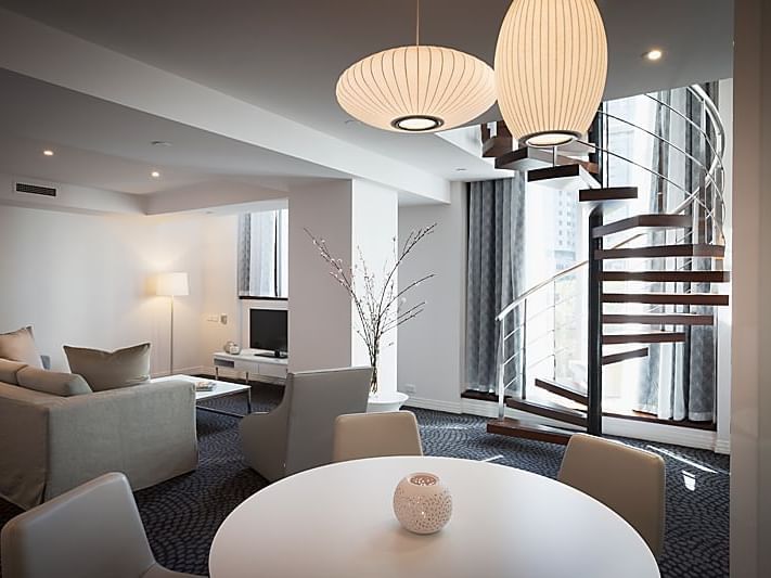 Lounge area & stairway in Pearl Penthouse at Como Melbourne