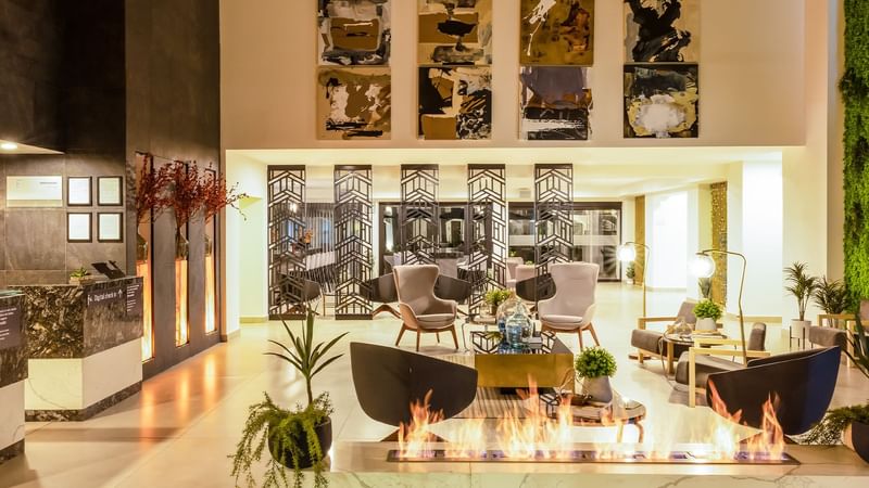 Fireplace by the lobby lounge area at Gamma Ciudad Juarez