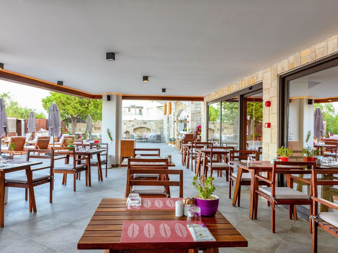 Dining tables set up in Sitara Restaurant at Senses Hotel