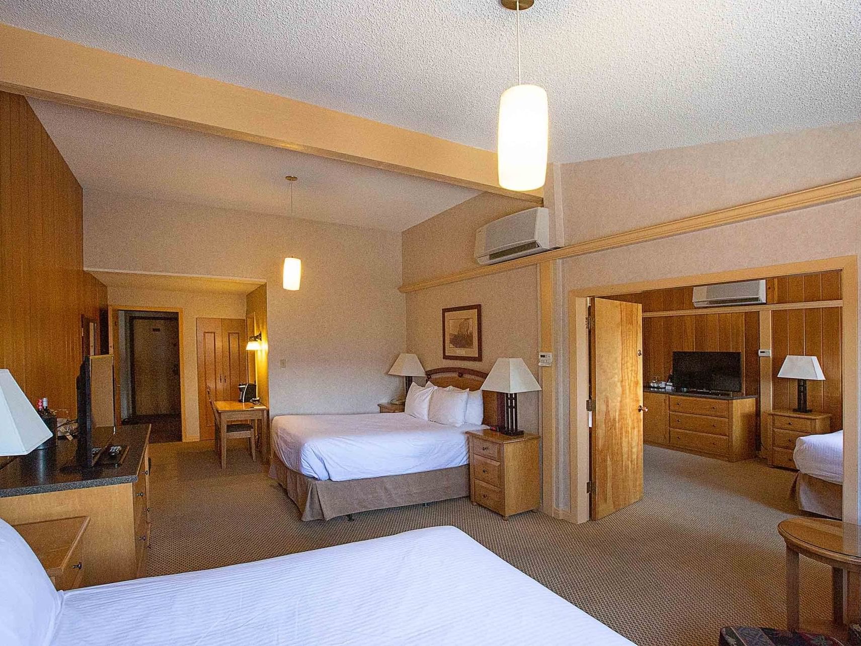 Bedroom with living area in Classic Family Room at Fairmont Hot Springs Resort