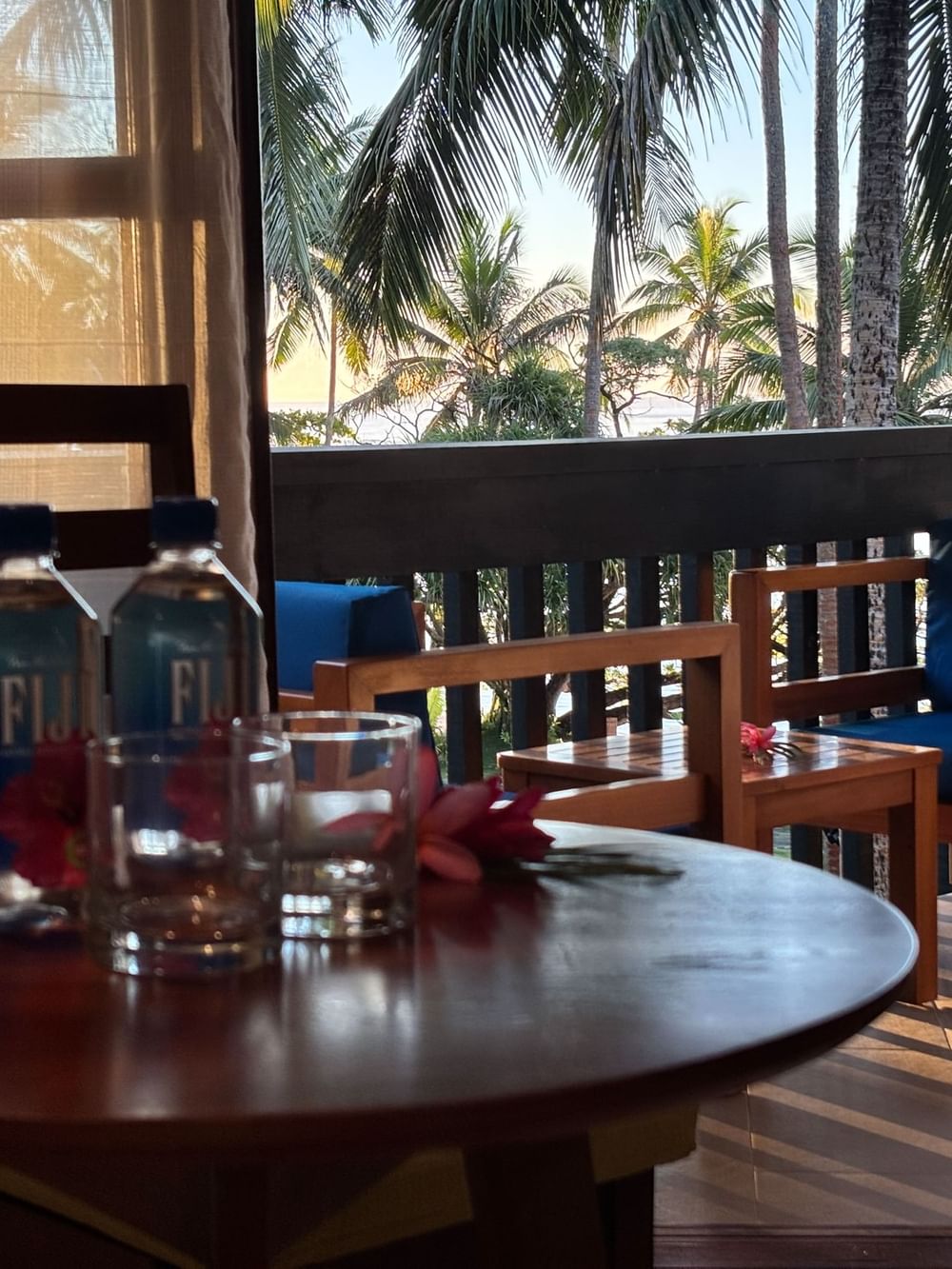 Table and balcony with ocean view in Deluxe Double Room at Warwick Fiji Korolevu.