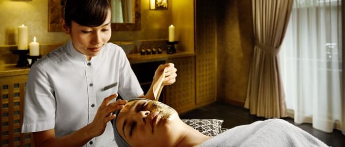Lady getting a facial treatment in the Wellness spa at The Banjaran Hotsprings Retreat