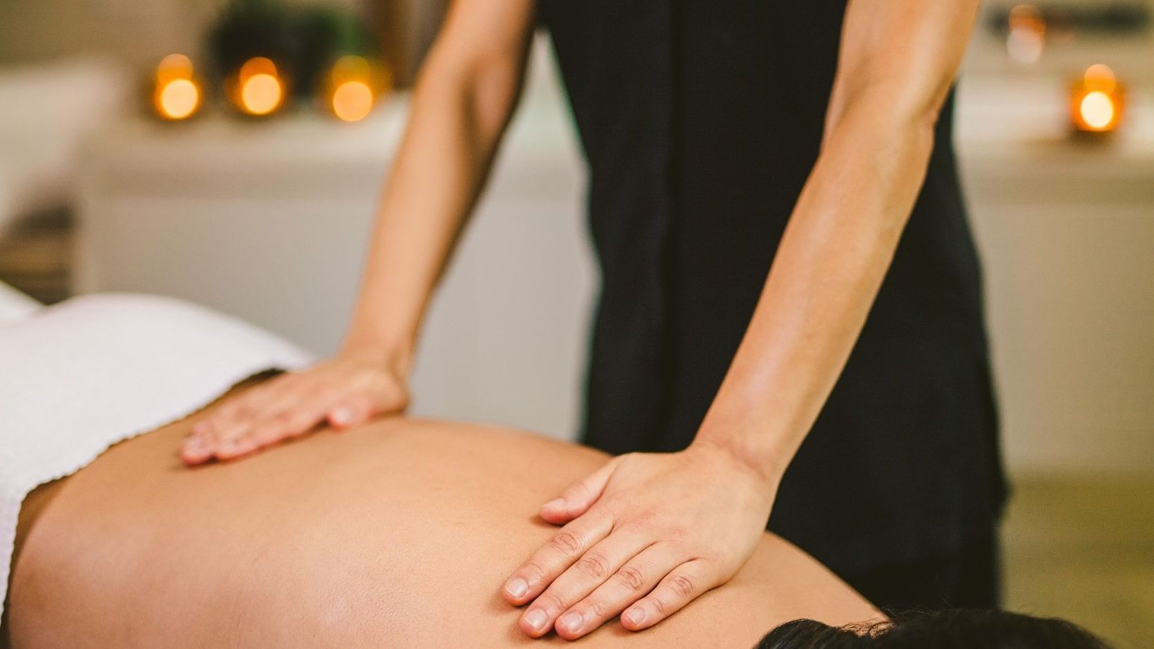 Man having Spa Treatments at Pullman Palm Cove Sea Temple Resort & Spa