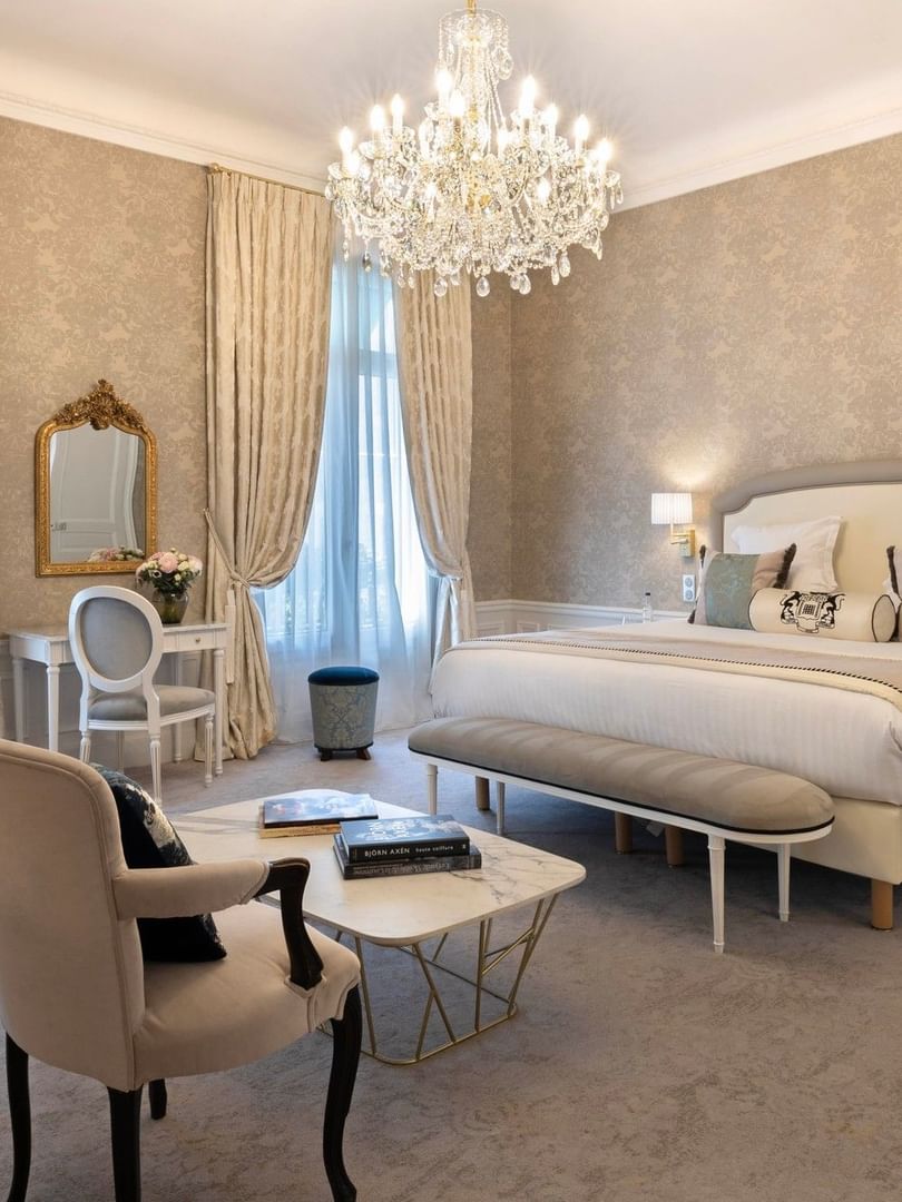 Elegantly decorated Prestige Suite with Rue de la Paix view at Hôtel Westminster Paris.