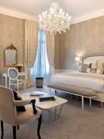 Elegantly decorated Prestige Suite with Rue de la Paix view at Hôtel Westminster Paris.