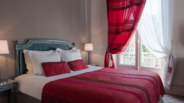 King bed in Hotel Normandie bedroom at The Original Hotels